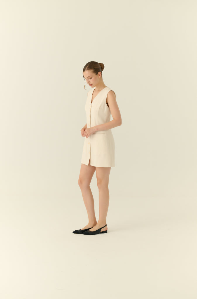 The parisian button down shift dress in beige