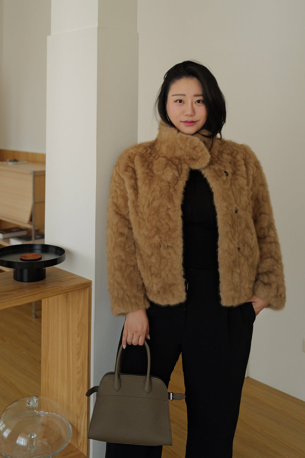 Swiss faux fur coat in brown